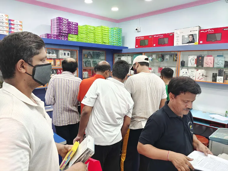 Busy checkout counter at Lokenath Infotech