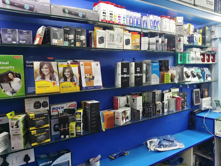 Shelves stocked with computer accessories and antivirus