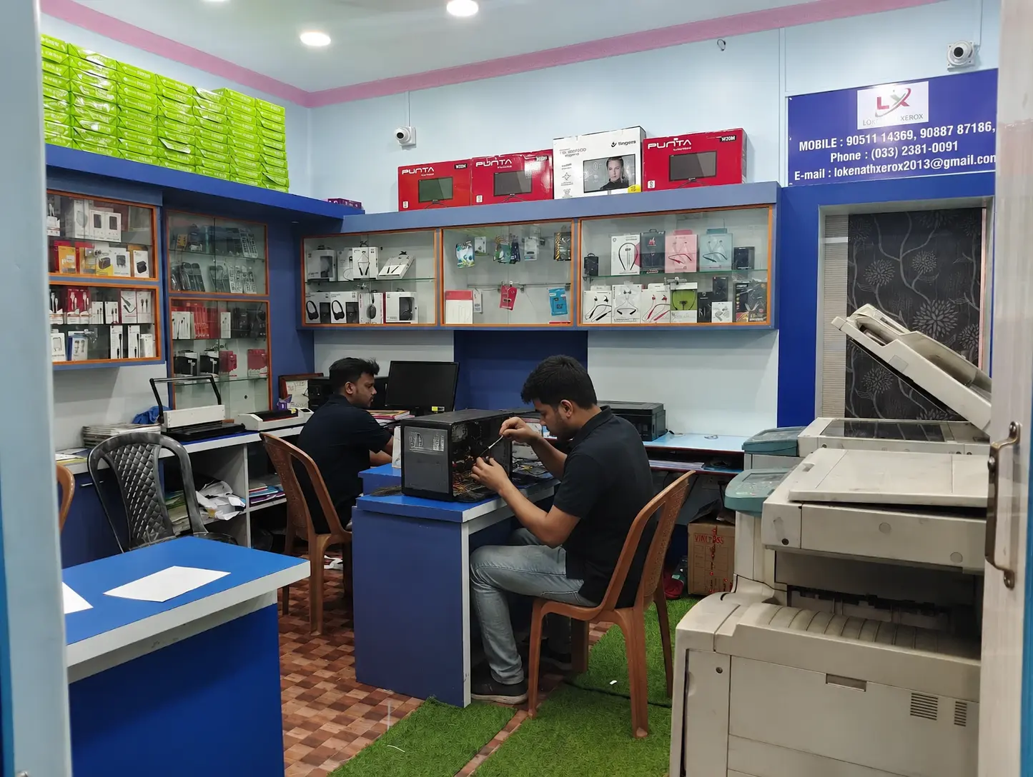 Lokenath Infotech interior with service desk and Xerox machine